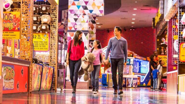 family walking out of carnival midway reno