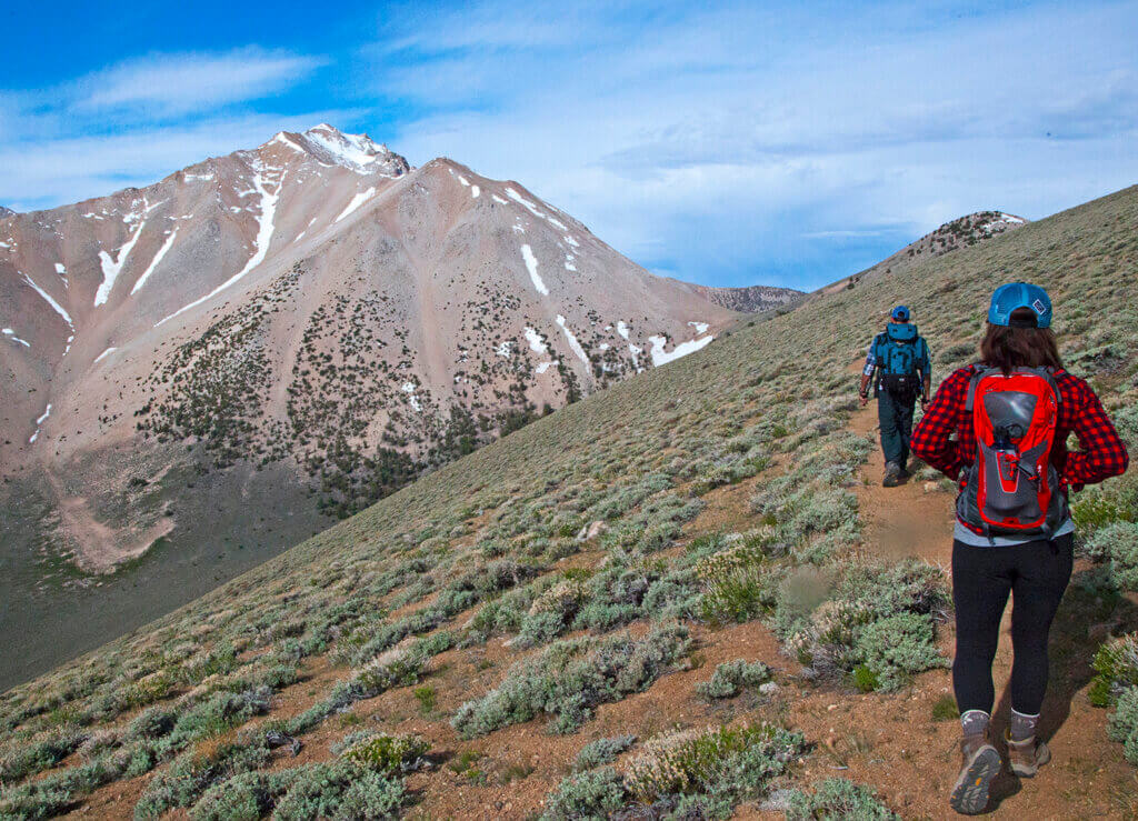 two people hiking the boundary peak wilderness