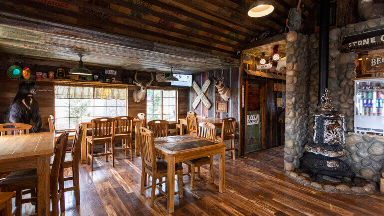 indoor dining tables at stone cabin coffee shop