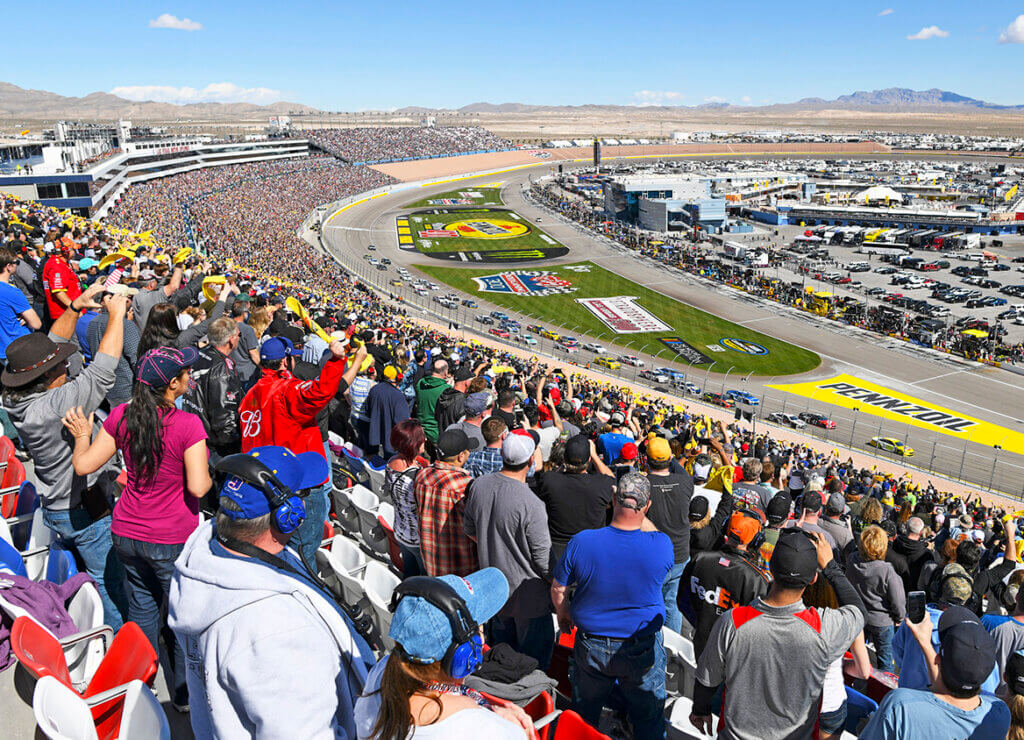 fans watching a race at the las vegas motor speedway