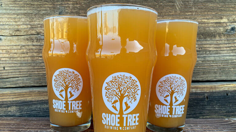 full beers displayed at shoe tree brewing company