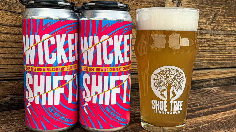 wicked shift beer cans and glass at shoe tree brewing company