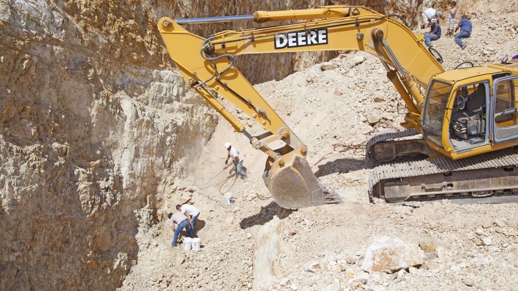 john deere tractor digging a hole at the royston turquoise mine