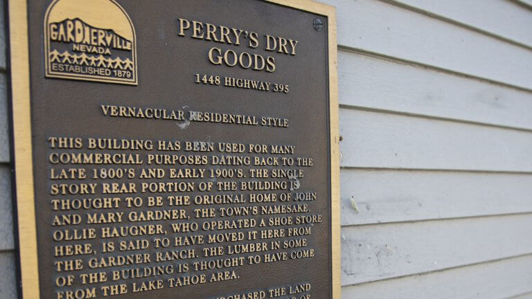 history sign for perrys dry goods