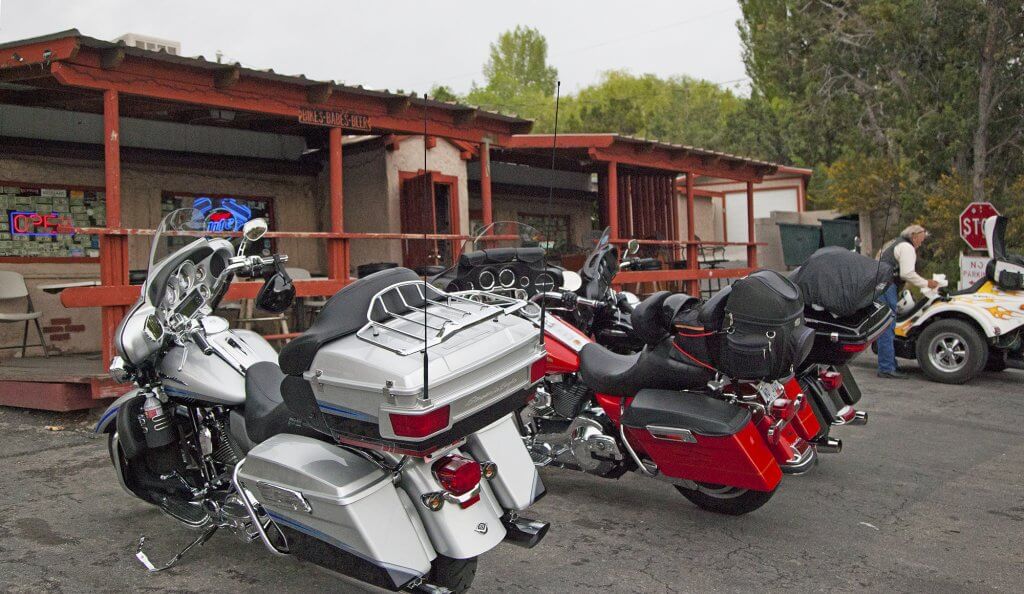 motorcycles lined up in front of the mountain springs saloon