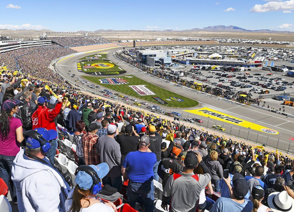 fans watch a race at las vegas motor speedway