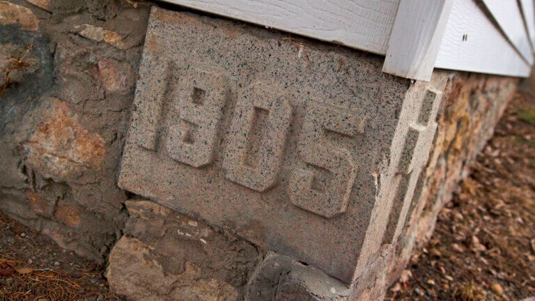 1905 brick sign at the little church of the crossroads