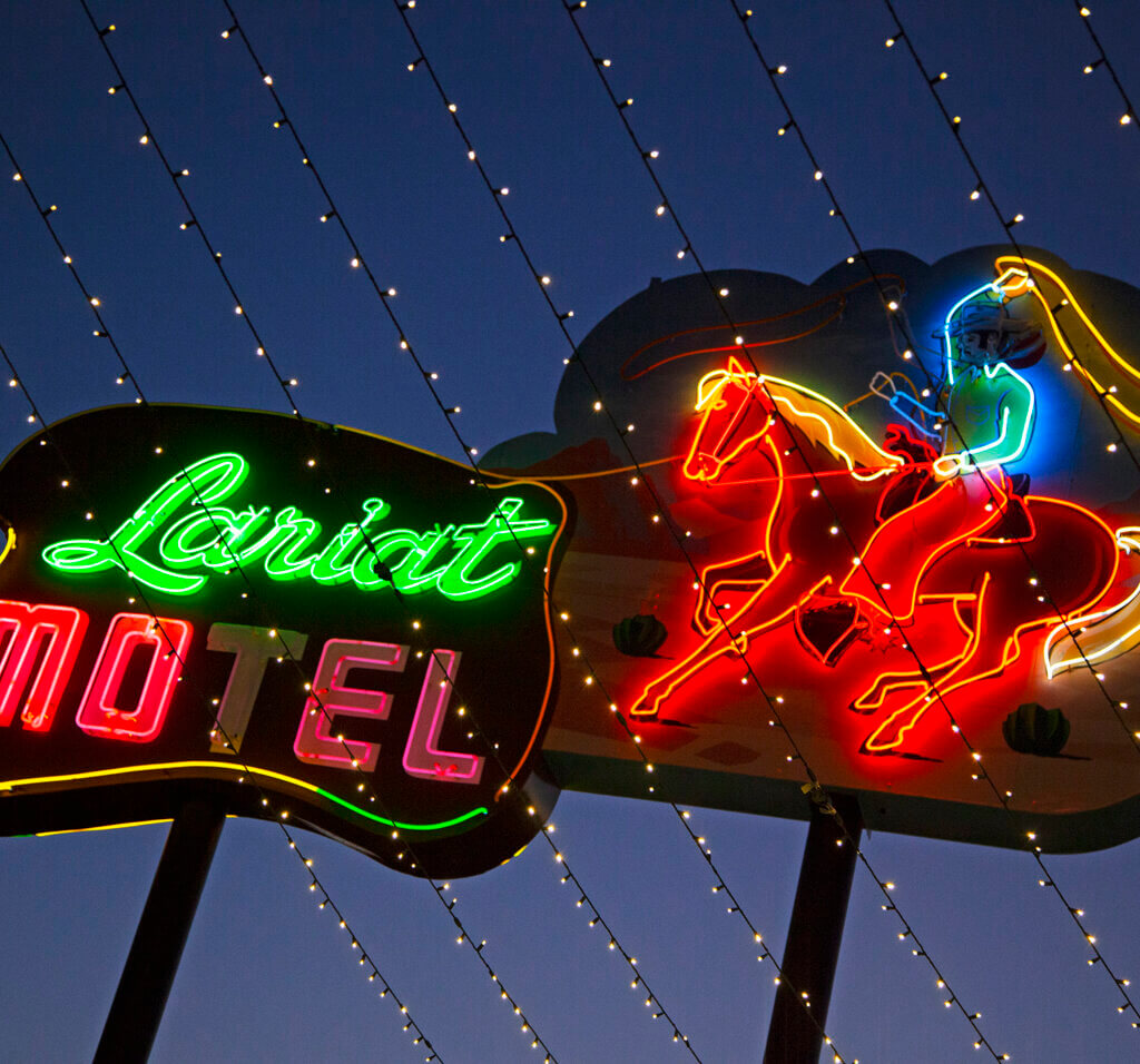neon sign for lariat motel