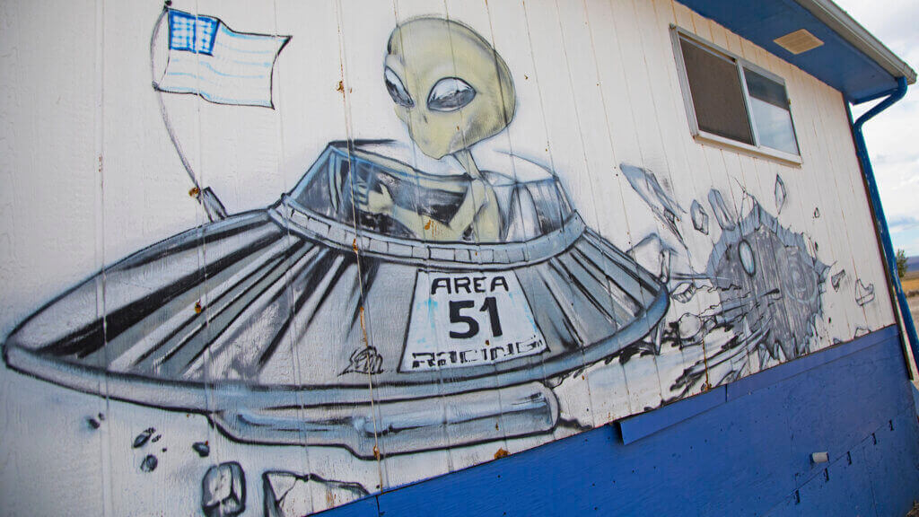 mural of an alien in a space saucer at area 51 las vegas