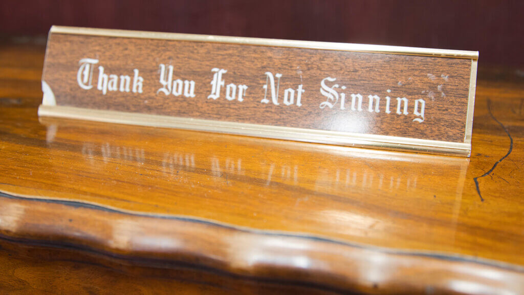 thank you for not sinning sign in saint mary in the mountains catholic church & museum