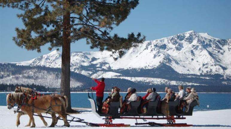 south lake tahoe sleigh rides in front of lake