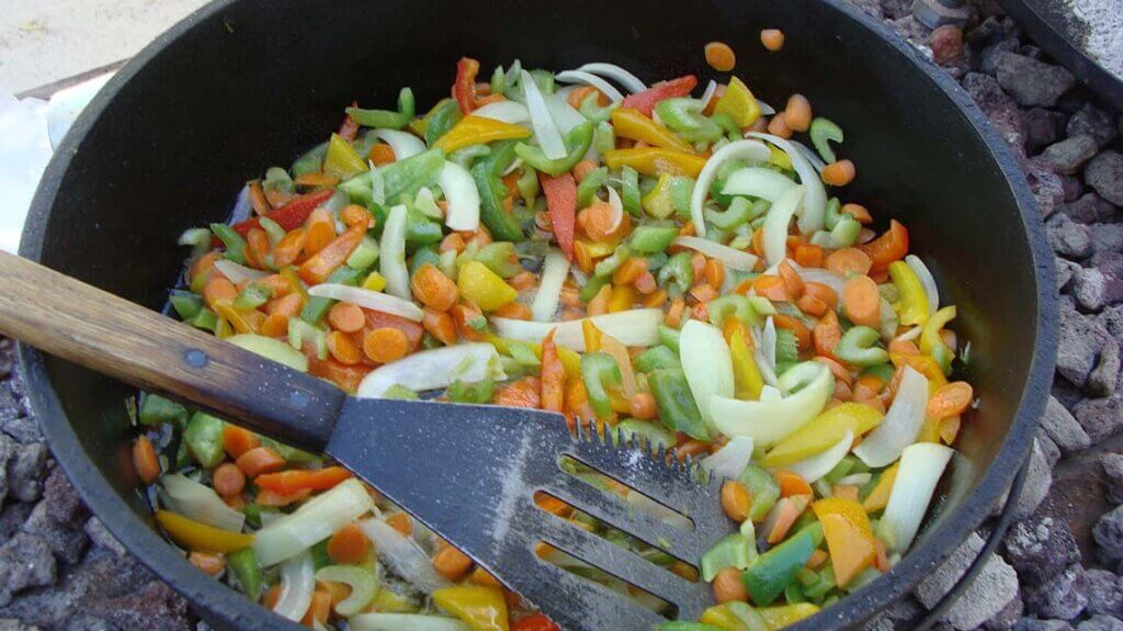 vegetables cooking in a dutch oven