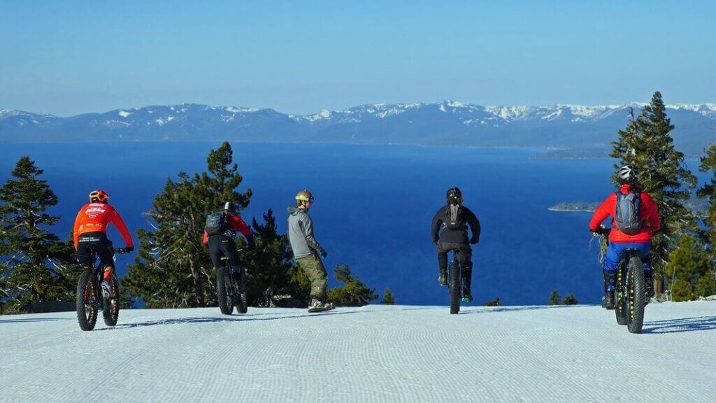 biking at diamond peak ski resort with lake tahoe in the background