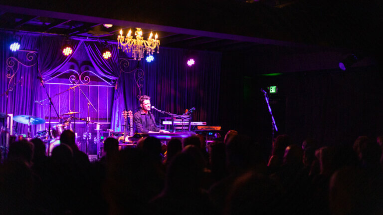 musician performing at the swan music hall nashville social club