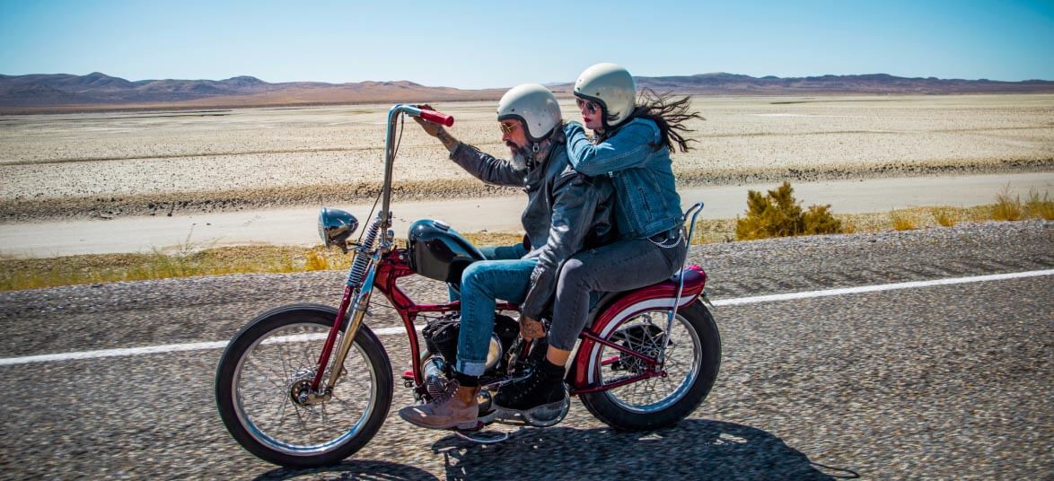 couple riding motorcycle in nevada