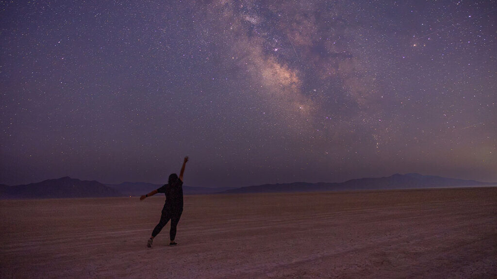 girl stargazing in the black rock desert in nevada