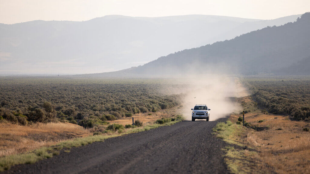 driving down a dirt road in vya nevada