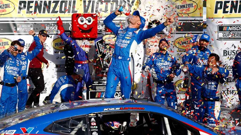 LAS VEGAS, NV - MARCH 03: Kyle Larson (#5 HendrickCars.com Hendrick Motorsports Chevrolet) celebrates in Victory Lane after winning the Pennzoil 400 presented by Jiffy Lube NASCAR Cup Series race on March 3, 2024, at Las Vegas Motor Speedway in Las Vegas, NV. (Photo by Jeff Speer/LVMS/Icon Sportswire)