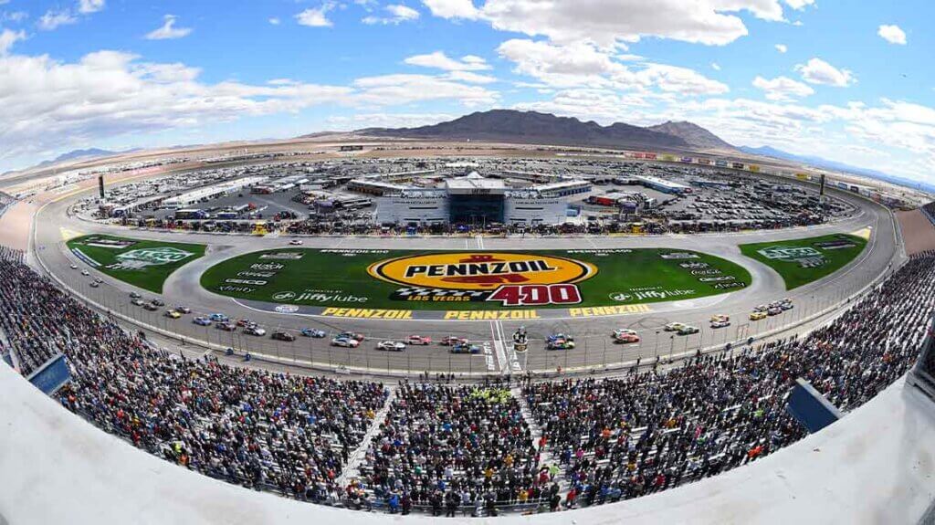 LAS VEGAS, NV - MARCH 06: Christopher Bell (#20 Joe Gibbs Racing DeWalt Toyota) leads the field across the starting line for the start of the race during the NASCAR Cup Series Pennzoil 400 presented by Jiffy Lube on March 06, 2022, at Las Vegas Motor Speedway in Las Vegas, NV. (Photo by Chris Williams/Icon Sportswire)