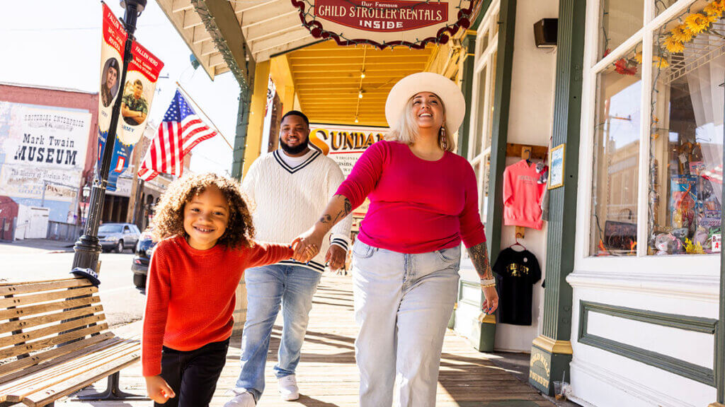 family strolling c street boardwalk in virginia city nevada