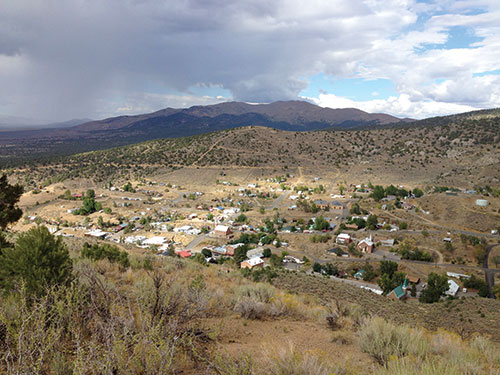View of Austin from above, sagebrush, clouds, mountains