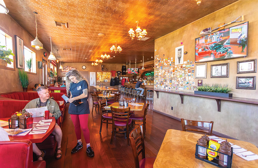 A waitress taking an order inside Tonopah Brewing Company.