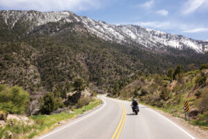 Man and woman on a motorcycle on Mt. Charleston Scenic Byway.