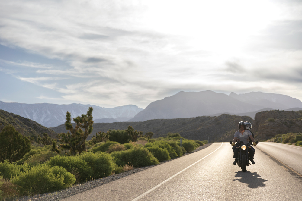 Man and woman on a motorcycle on Mt. Charleston Scenic Byway.