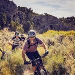 People biking at Cave Lake State Park.