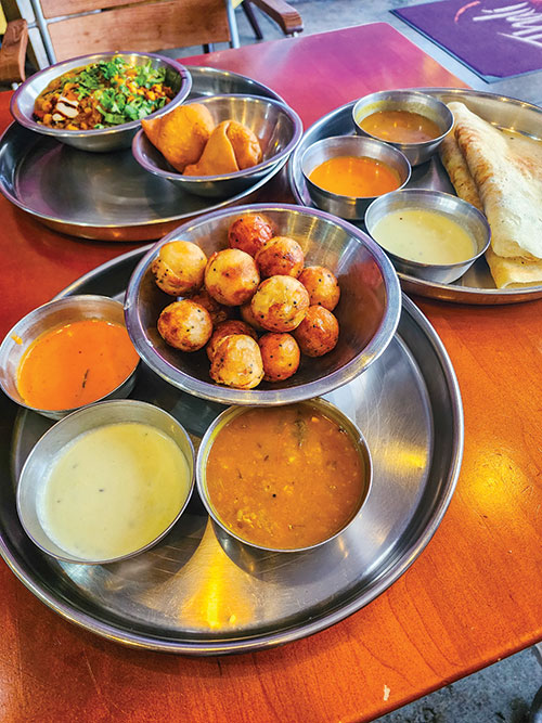 A table full of Indian food from Thali