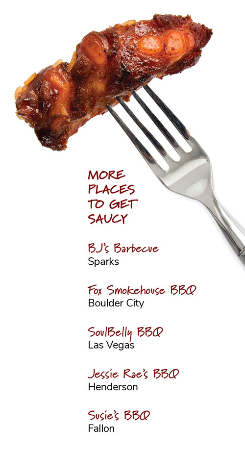 A piece of barbecued short rib at the end of a fork