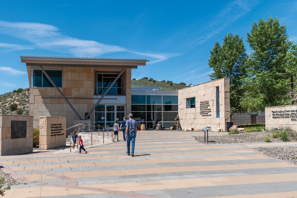 Family walking towards the front entrance of the California Trail Interpretive Center.