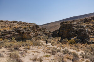 Woman walking into Fly Canyon.