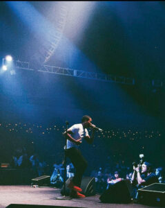 Jared Crawford performing in front of a live crowd.