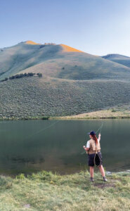 Woman fishign in Kingson Canyon.