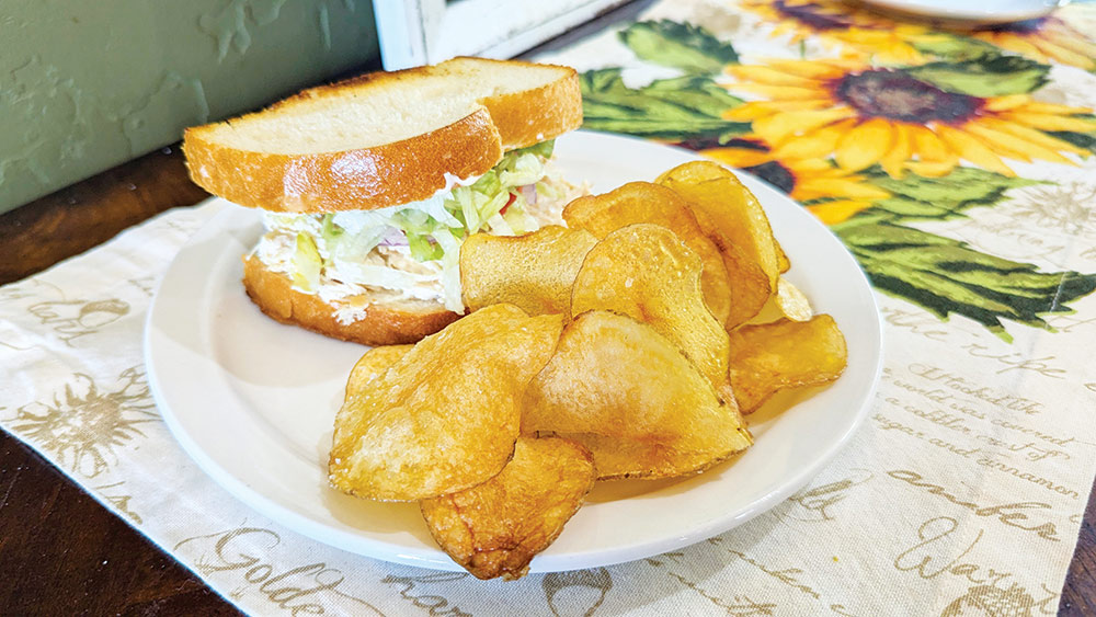 Fallon sandwich with house-made potato chips from The Slanted Porch. Photo ©Kristen Kabrin