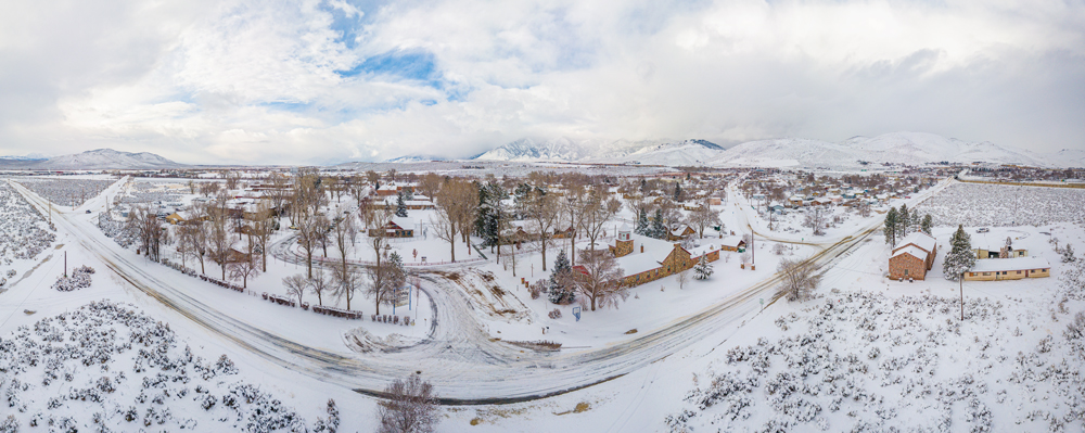 Snowy aerial shot of Stewart Indian School campus. 