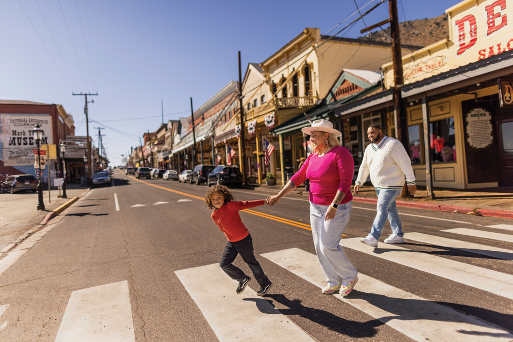 Family walking across the street in Virginia City.