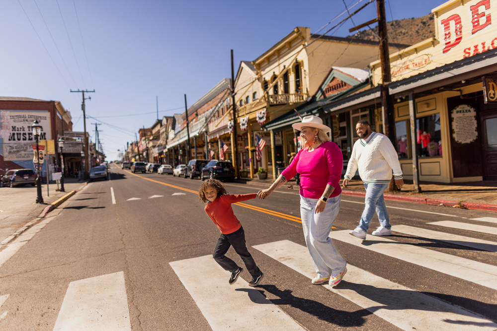 Family walking across the street in Virginia City.