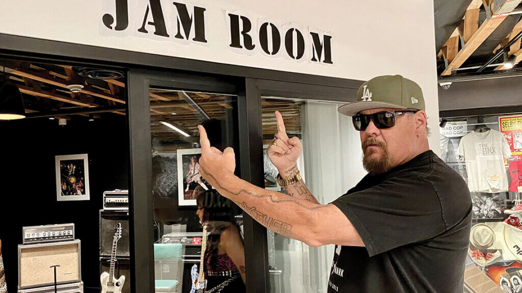 fletcher from the band pennywise outside the jam room at the punk rock museum in las vegas nv