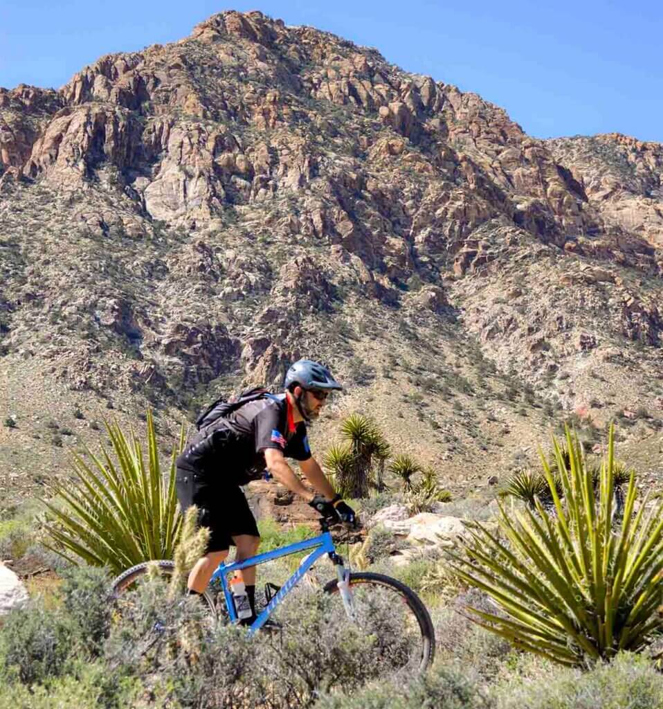 man mountain biking in southern nevada