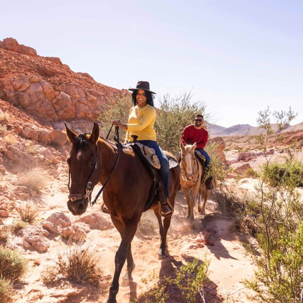 couple horseback riding in southern nevada