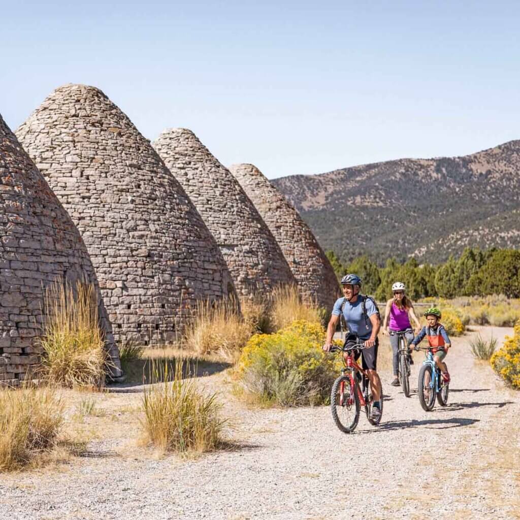 a family rides bikes at the ward charcoal ovens