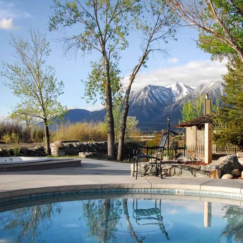 view of pool and snowy mountain range at david walleys resort
