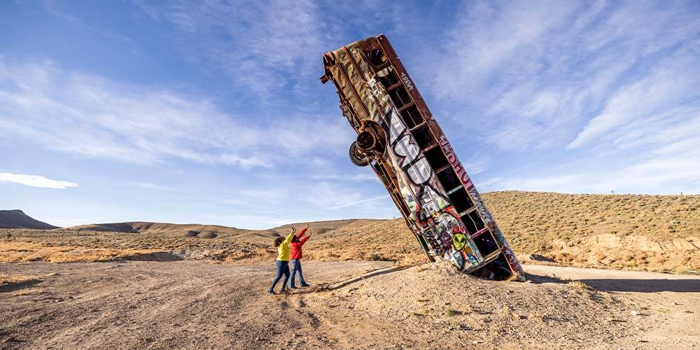friends sightseeing at international car forest