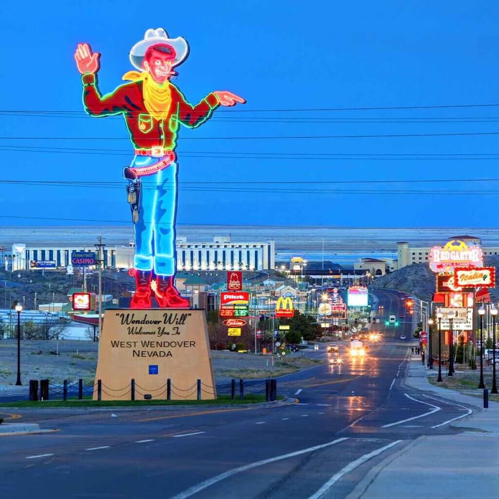 neon cowboy statue at west wendover