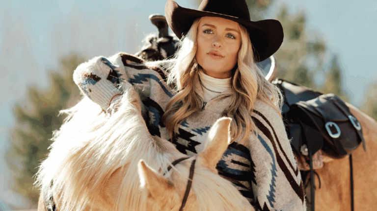Founder Jordan Bader is pictured with a white horse.
