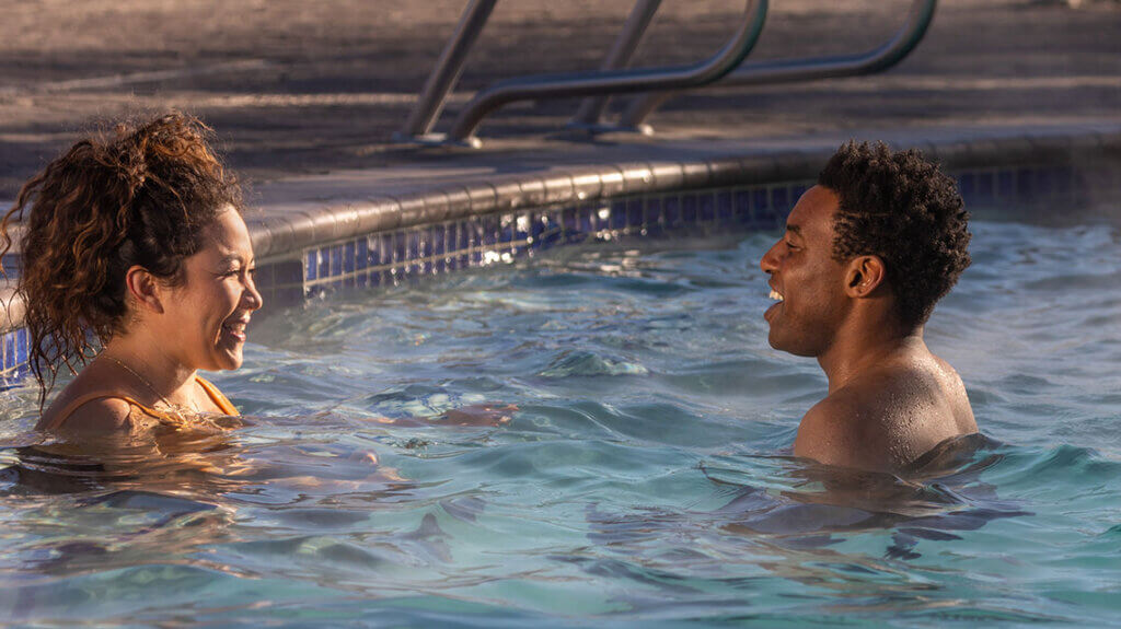 couple in a pool at carson hot springs in carson city nevada