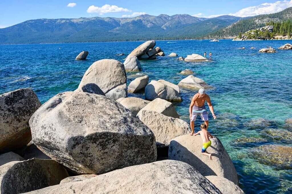 father and kid at lake tahoe sand harbor state park
