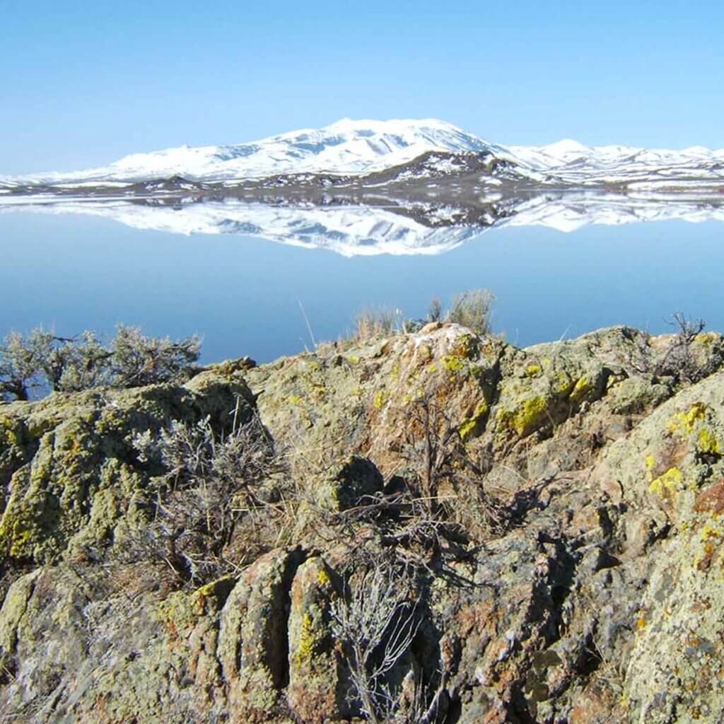 view of snowy mountains at wild horse state recreation area in nevada
